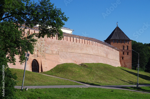 VELIKY NOVGOROD, RUSSIA - July, 2021: Novgorod Kremlin, walls and towers on a sunny summer day photo