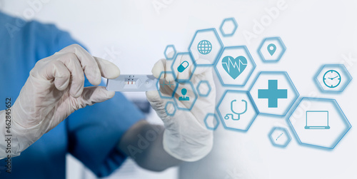 Medicine doctor using digital healthcare and network connection on hologram modern virtual screen interface icons, Medical technology futuristic concept.