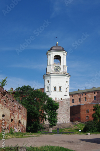 Vyborg, Russia - July, 2021: Clock Tower - a tower in Vyborg, the dominant feature of the Old Town, the former cathedral bell tower