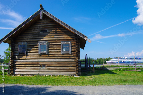 Kizhi, Karelia, Russia - July, 2021: Traditional northern wooden houses on the territory of the Kizhi Museum