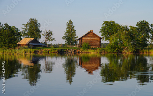 Kizhi, Karelia, Russia - July, 2021: Traditional northern wooden houses on the territory of the Kizhi Museum