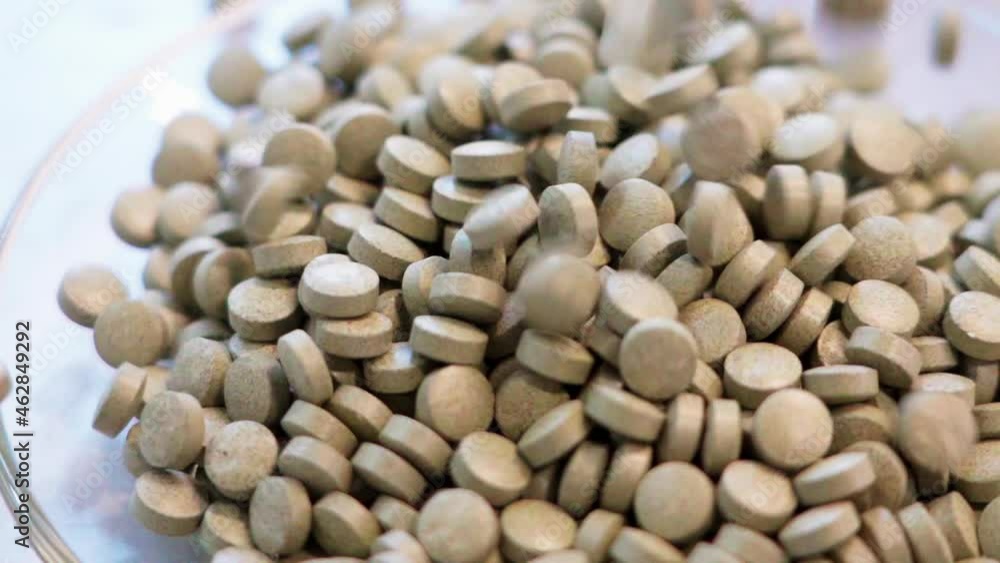 pills dropping white background slow motion 100fps pills dropping white background slow motion 100fps