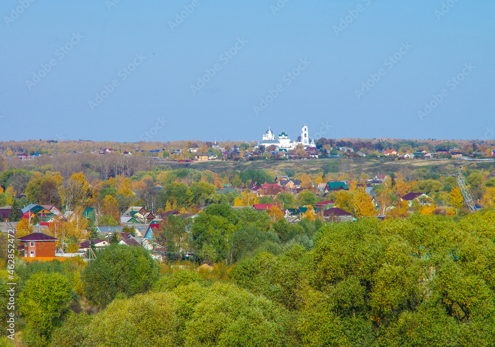 Pereyaslavl-Zalessky, Yaroslavl Oblast, Russia - October, 2021: Top view on the ancient town of Pereslavl-Zalessky on the Bank of Plescheevo lake in sunny autumn day