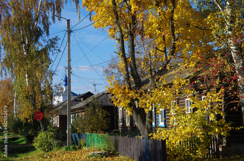 Pereyaslavl-Zalessky, Yaroslavl Oblast, Russia - October, 2021: The street in Pereslavl-Zalessky in sunny autumn day photo