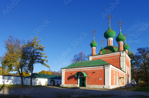 Pereyaslavl-Zalessky, Yaroslavl Oblast, Russia - October, 2021:  Ancient church of Alexander Nevsky on the Red square in sunny autumn day photo