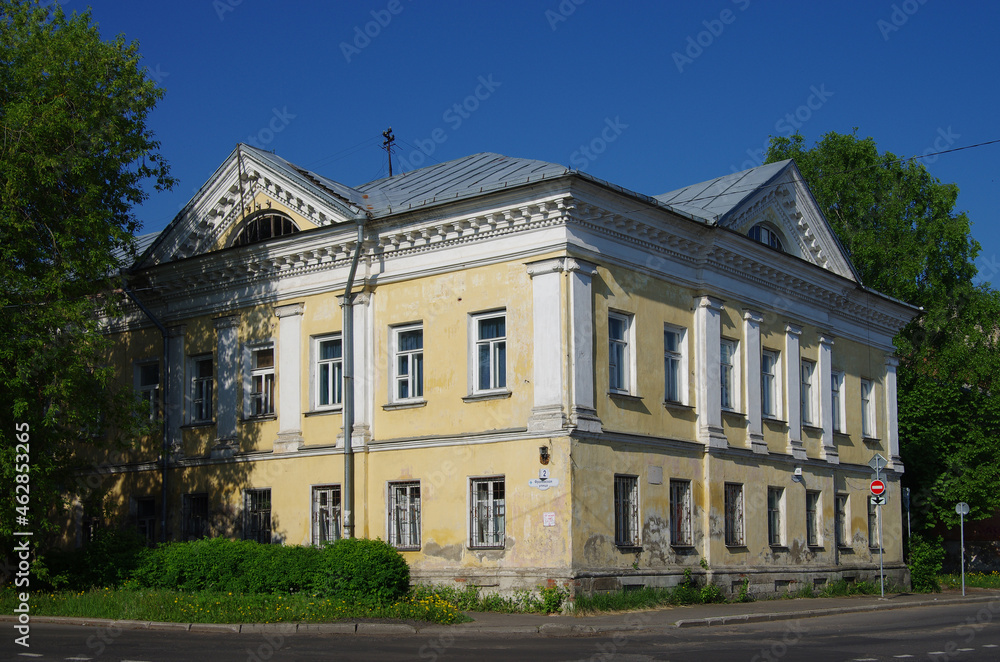 Rybinsk, Russia - May, 2021: View of the street of the city. Old hous on Volzhskaya street