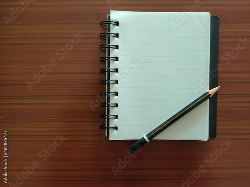 A Notebook with pencil