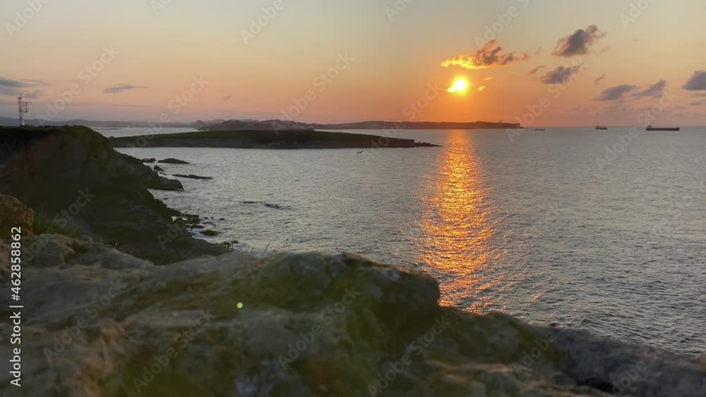 View of the coast at sunset in Cantabria, Spain