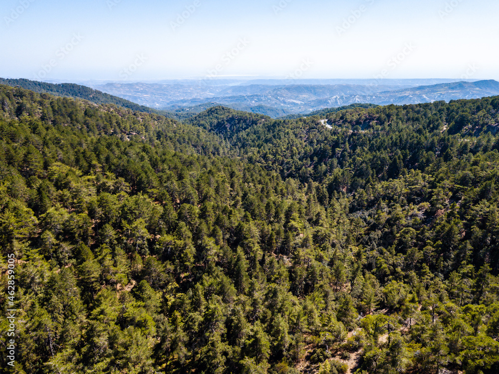 Aerial view from drone of forested rocky hills landscape
