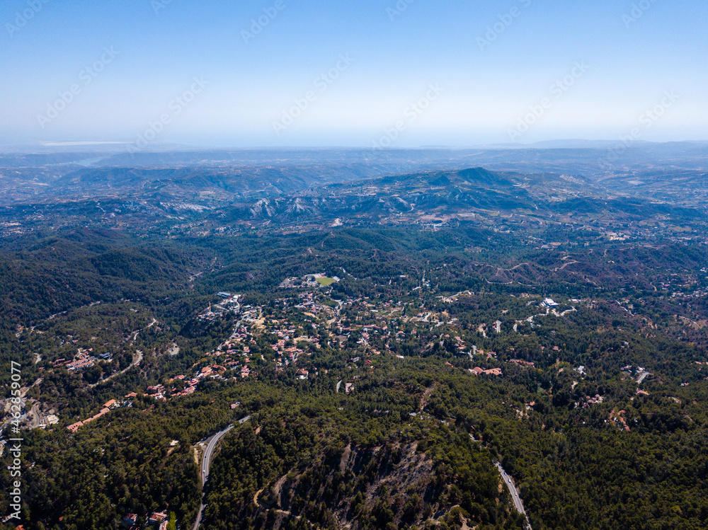 Top view on forested rocky hills landscape