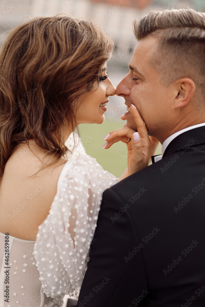 Portrait of wedding day. romantic gentle touch, concept of love and happy marriage. touching attitude of young couple. portrait of bride and groom. Life style, photo. Portrait of wedding day. romantic gentle touch, concept of love and happy marriage. touching attitude of young couple. portrait of bride and groom. Life style, photo.