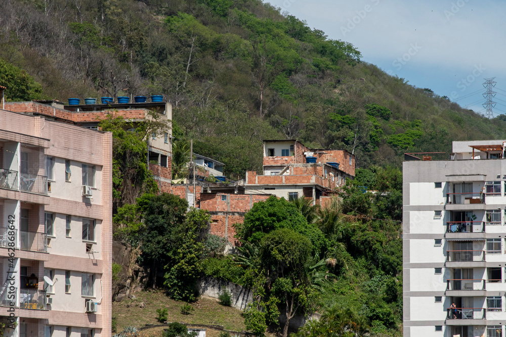 Φωτογραφία urban area with slums, simple buildings usually built on the hillsides of the ci