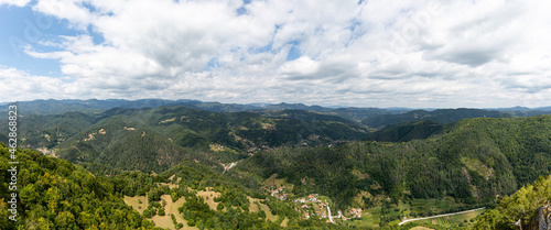 Mountain and forest with dramatic cloudy sky