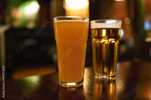 A glass of beer at the bar. Different types of beer