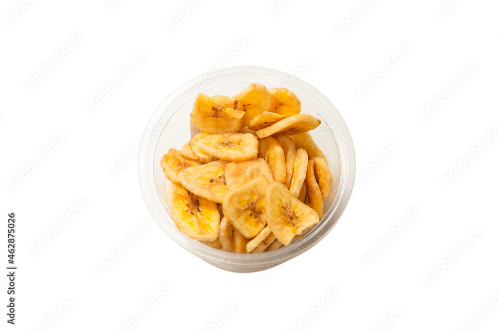 Banana chips isolated on a white background. Dehydrated banana. Banana chips isolated on a white background. Dehydrated banana.
