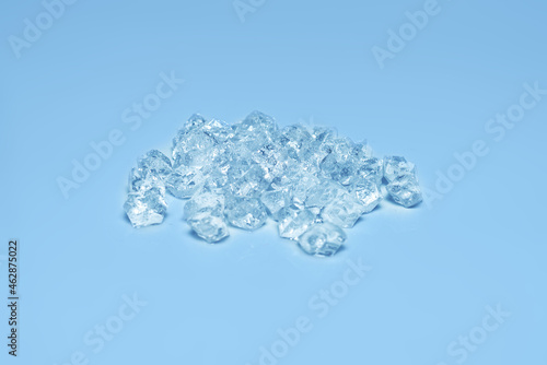 Ice crystal cubes, space for text or design. © Nikolay