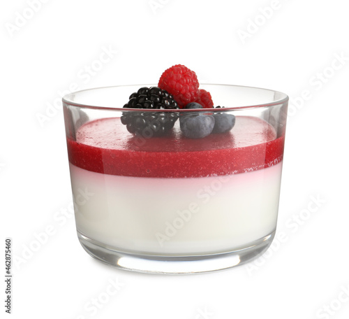 Delicious panna cotta with fruit coulis and fresh berries isolated on white photo