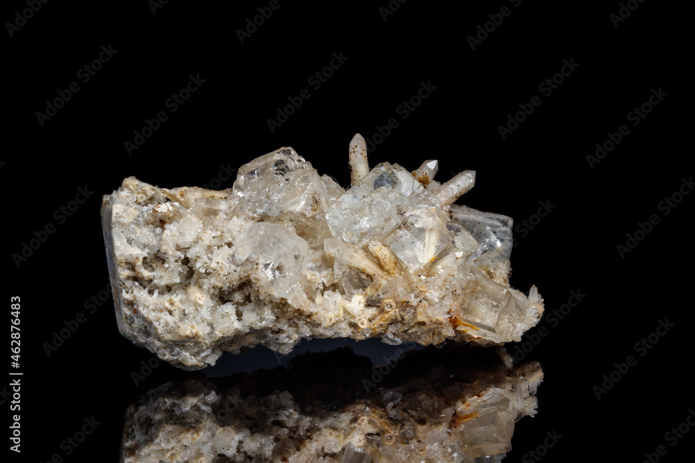 Macro mineral stone fluorite with quartz against black background Macro mineral stone fluorite with quartz against black background