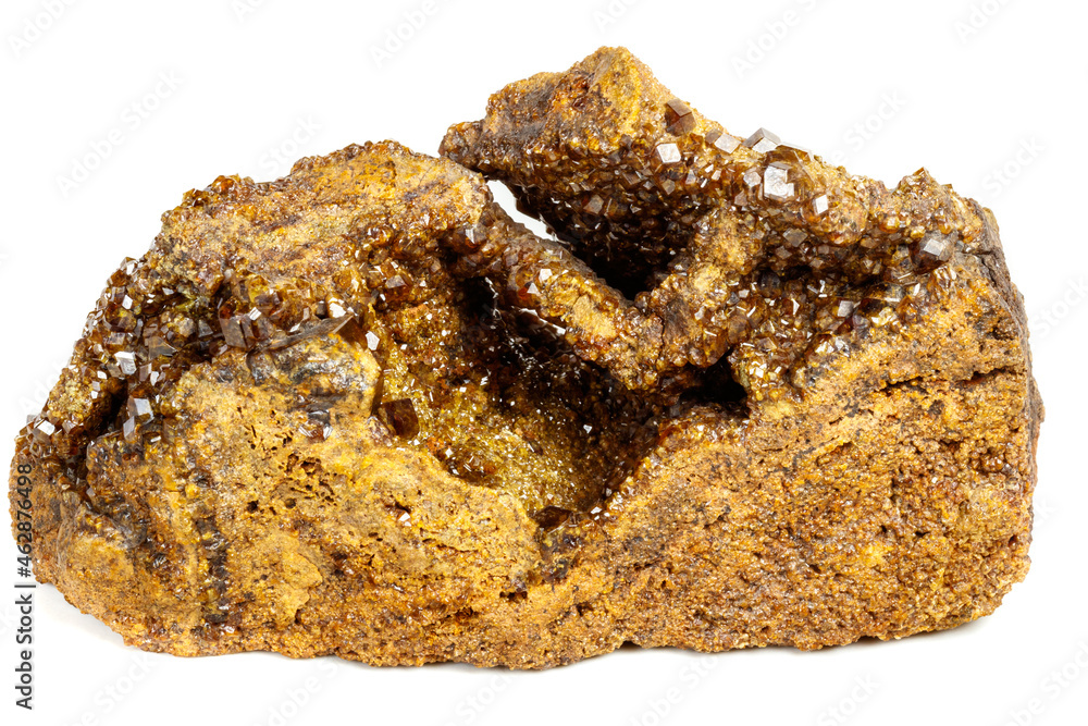 Macro mineral stone Garnet, Green Garnet, Epidote Grossular in the rock on a white background Macro mineral stone Garnet, Green Garnet, Epidote Grossular in the rock on a white background