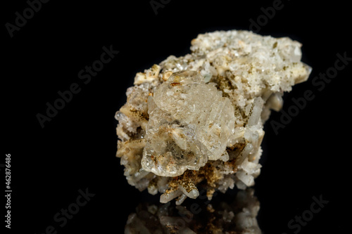 Macro mineral stone fluorite with quartz against black background