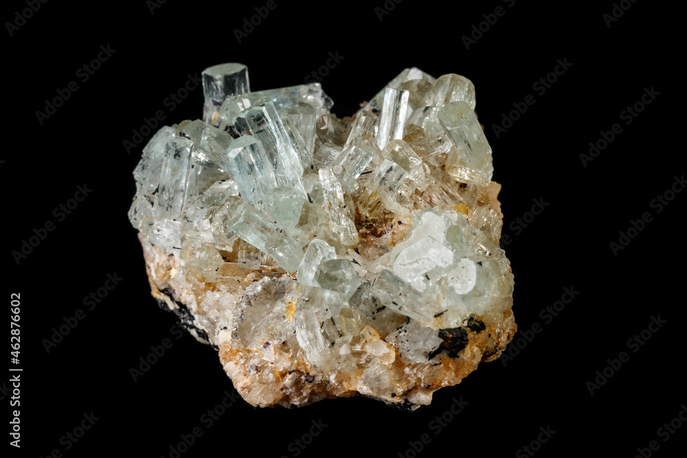 Macro mineral stone crystals Aquamarine in rock on a black background Macro mineral stone crystals Aquamarine in rock on a black background