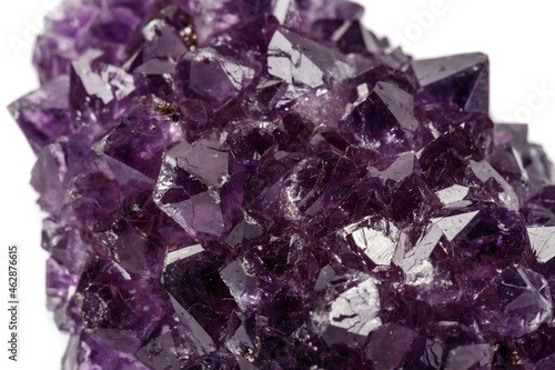Macro mineral stone Amethysts eye crystals on white background
