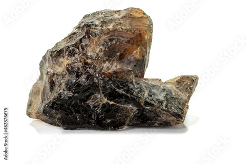 Macro mineral stone smoky quartz, rauchtopaz on a white background