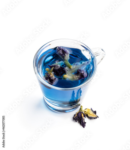 Butterfly pea flower tea in clear glass mug isolated on white