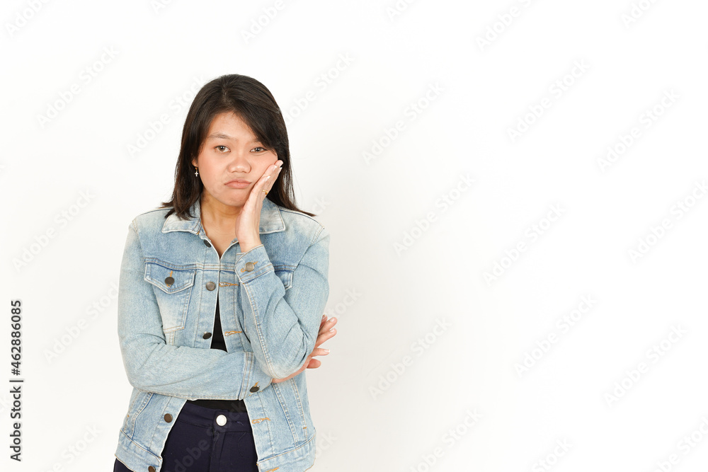 Boring Gesture of Beautiful Asian Woman Wearing Jeans Jacket and black shirt Isolated On White Background Boring Gesture of Beautiful Asian Woman Wearing Jeans Jacket and black shirt Isolated On White Background