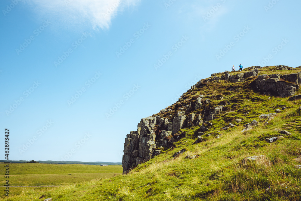 Northumberland UK: 07-31-2020 a sunny summer day in English countryside cliffs near the Roman Wall