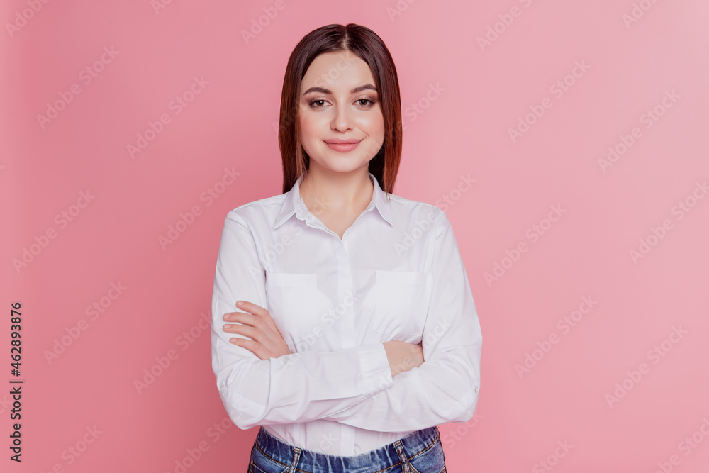 Fototapeta premium Photo of young attractive business woman confident crossed hands isolated over pink color background