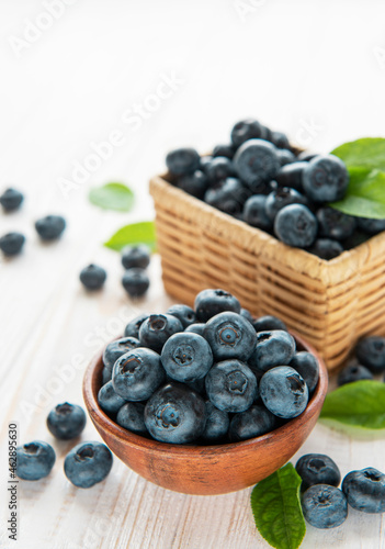 Blueberries on old wooden background