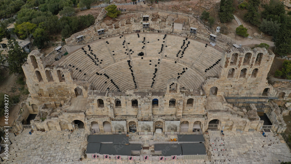Aerial drone photo from iconic ancient theatre of Herodes Atticus near Acropolis hill, Athens historic centre, Attica, Greece                              
