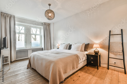 Modern bedroom interior with furniture in house