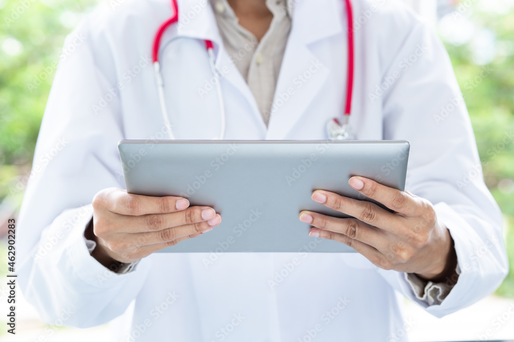 Doctor, working, on tablet, close-up, medical technology concept. Doctor, working, on tablet, close-up, medical technology concept.