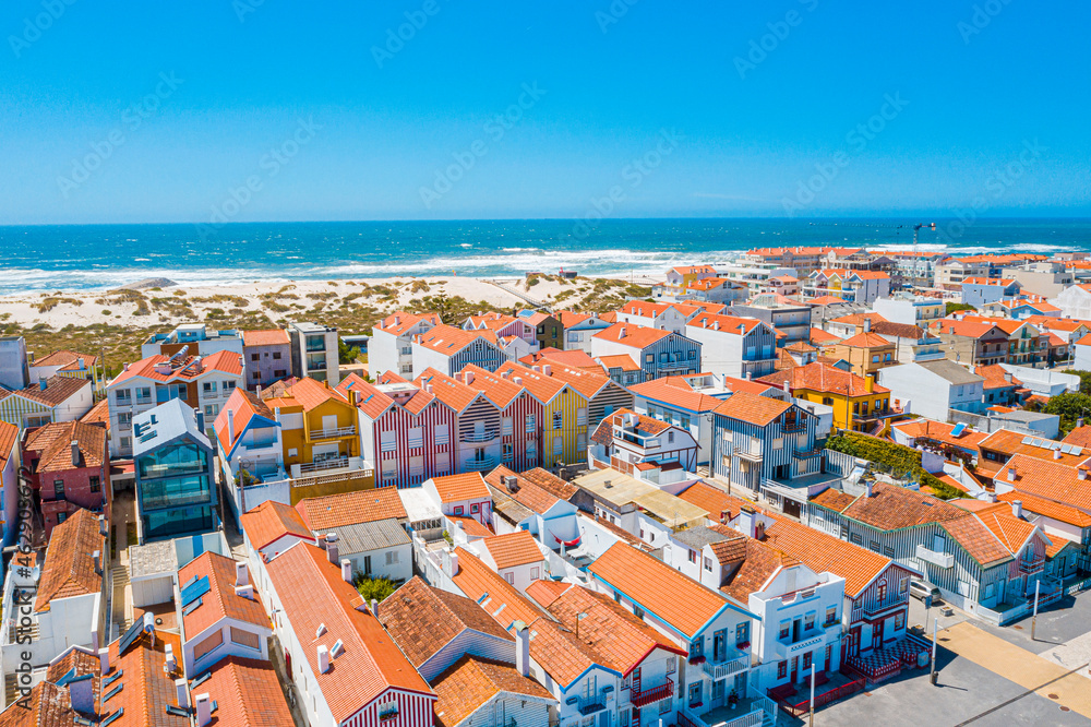 Aerial View of  Costa Nova Do Prado in Portugal, street with colorful and striped houses 