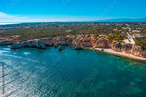Flying over the sea cliff at Ponta Da Piedade in Algarve, Portugal 