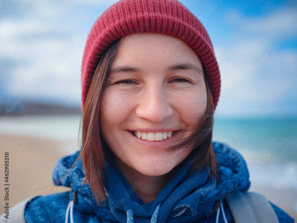 woman taking selfie on smartphone, female travels along the coast in the cold season. Outdoor. POV. Close up woman taking selfie on smartphone, female travels along the coast in the cold season. Outdoor. POV. Close up