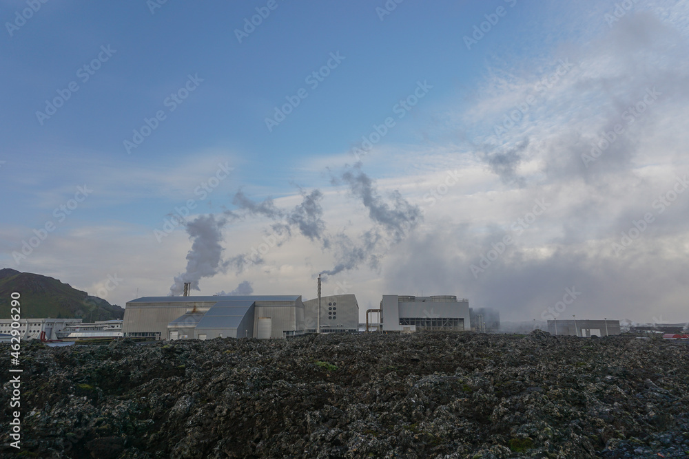 Grindavik, Iceland: Behind a field of lava rocks, the Svartsengi power plant (1976) was the world´s first geothermal source for electric power generation and hot water production.