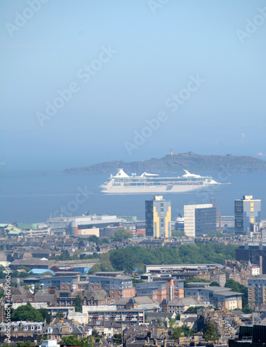 the capital of Scotland, is a small town on the hills. It has a medieval old town and an elegant Georgian neighborhood called New Town, full of neoclassical garden photo