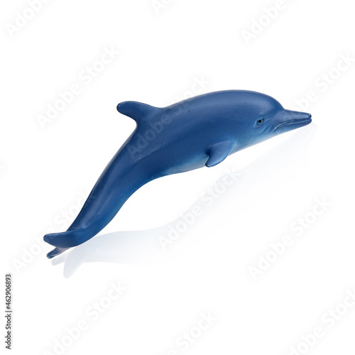 Dolphin family. Figurine isolated on white background