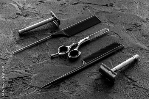 Barber tools with hairdressing scissors and combs