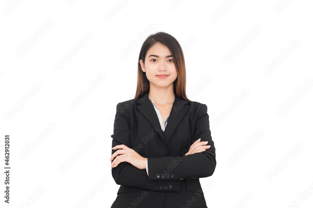 A woman wearing a black suit is standing with her arms crossed and looking at the camera on a white background. A woman wearing a black suit is standing with her arms crossed and looking at the camera on a white background.