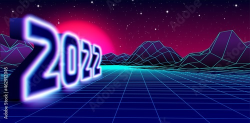 2022 neon sign for 80s styled retro New Years Eve celebration with arcade game grid landscape and purple sun.