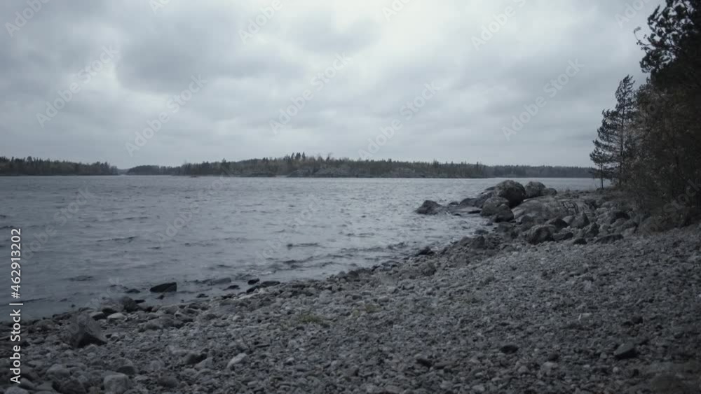 landscape with lake and rocky shore landscape with lake and rocky shore