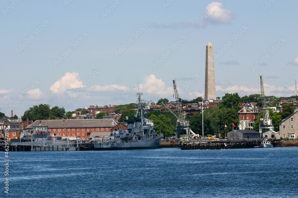 The Boston Massachusetts Waterfront and Cityscape from the Bay with the Bunker Hill Monument Prominent in the Scene