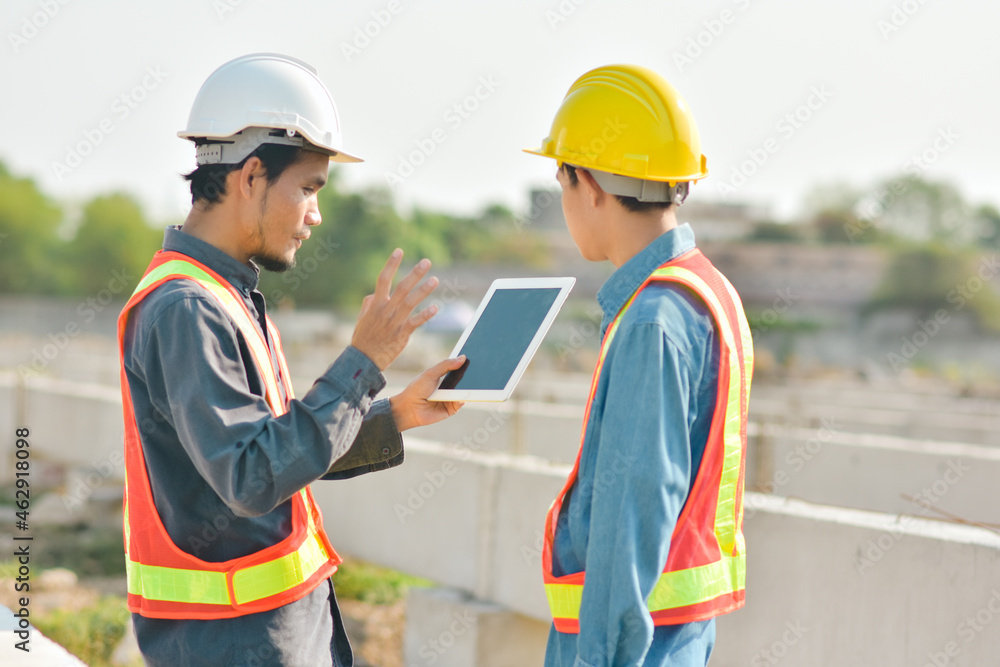 Teamwork Engineer working work hard on site construction Teamwork Engineer working work hard on site construction