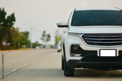 Fototapeta Naklejka Na Ścianę i Meble -  Car parking on road sun set background