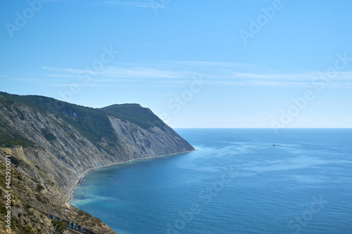 Black sea coast in Russia in Anapa, bright sunny day. High steep cliffs and mountains. The largest Russian resort.