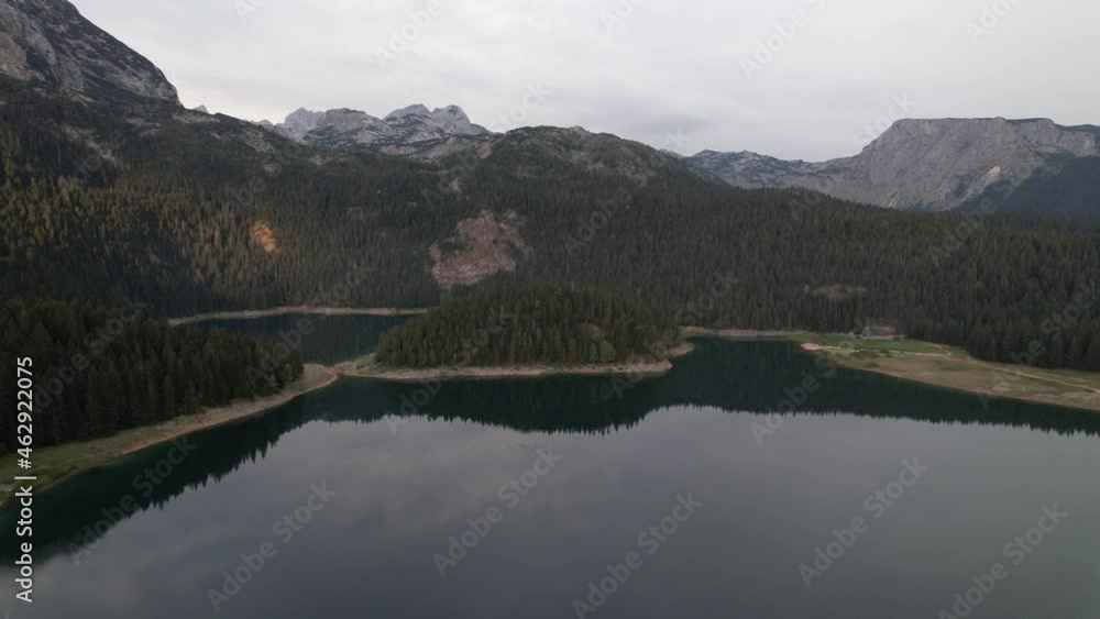 Aerial view of the Black Lake or Crno jezero , northern Montenegro. It is a glacial lake on the Mount Durmitor, on an altitude of 1,416 m. Black lake in Durmitor national park near Zabljak, Europe Aerial view of the Black Lake or Crno jezero , northern Montenegro. It is a glacial lake on the Mount Durmitor, on an altitude of 1,416 m. Black lake in Durmitor national park near Zabljak, Europe